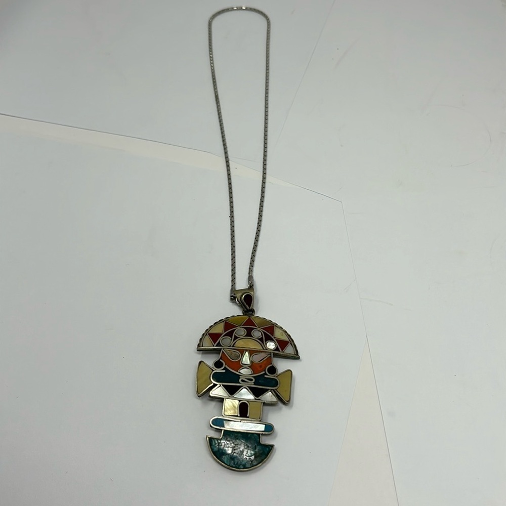 Handmade necklace from Peru with the chakras on the back, medium length